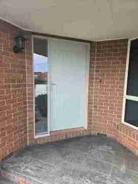 After - Solid Modern Style Door with Double Glazed Side Panel - Narre Warren North
